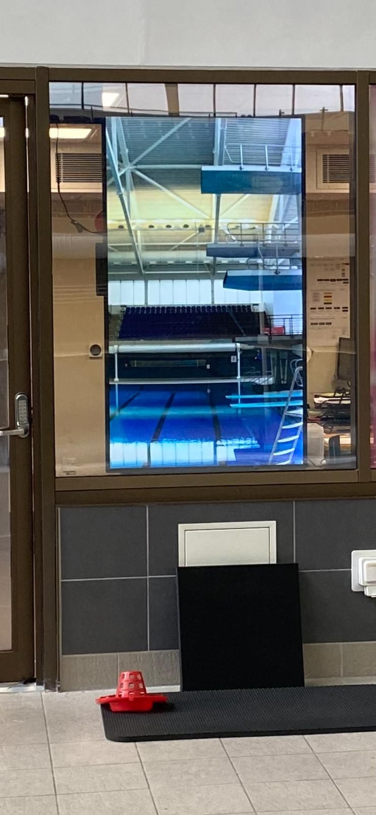 Poolside Diving Replay System - Poolside office window view